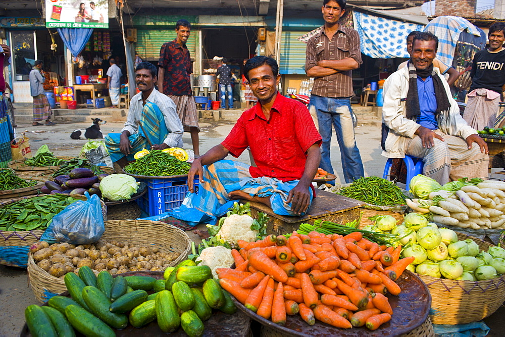 Man selling vegetables in Barisal, Bangladesh, Asia