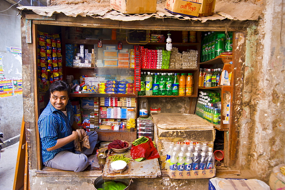 Man in his small shop, Dhaka, Bangladesh, Asia