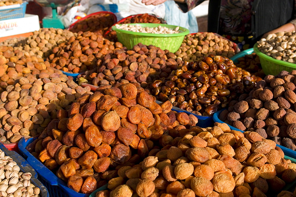 Dried fruits on market stall, Osh, Kyrgyzstan, Central Asia, Asia