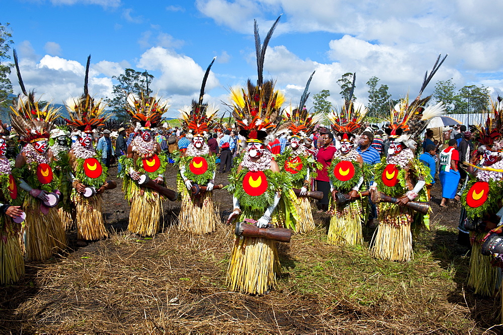 Colourfully dressed and face painted local tribes celebrating the traditional Sing Sing in the Highlands, Papua New Guinea, Pacific