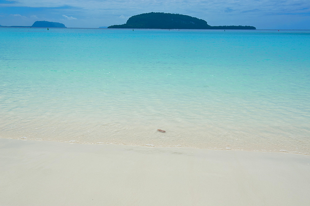 Turquoise water and white sand at the Champagne beach, Island of Espiritu Santo, Vanuatu, South Pacific, Pacific