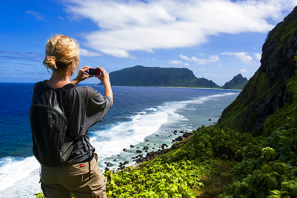 Woman trekking on Ofu Island, Manua Island group, American Samoa, South Pacific, Pacific