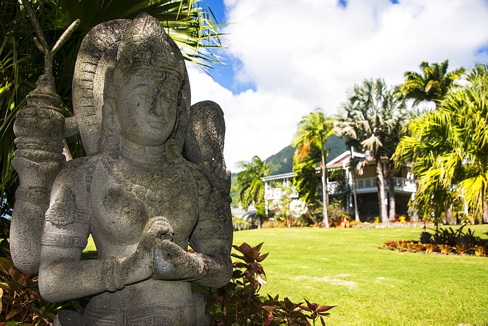 Buddhist statues in the Botanical Gardens on Nevis Island, St. Kitts and Nevis, Leeward Islands, West Indies, Caribbean, Central America 