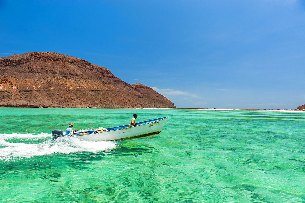 Little boat in the turquoise waters at Isla Espiritu Santo, Baja California, Mexico, North America