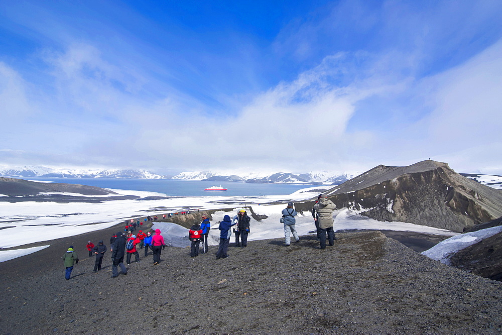 Tourists looking at the Volcano crater at Deception Island, South Shetland Islands, Antarctica, Polar Regions 