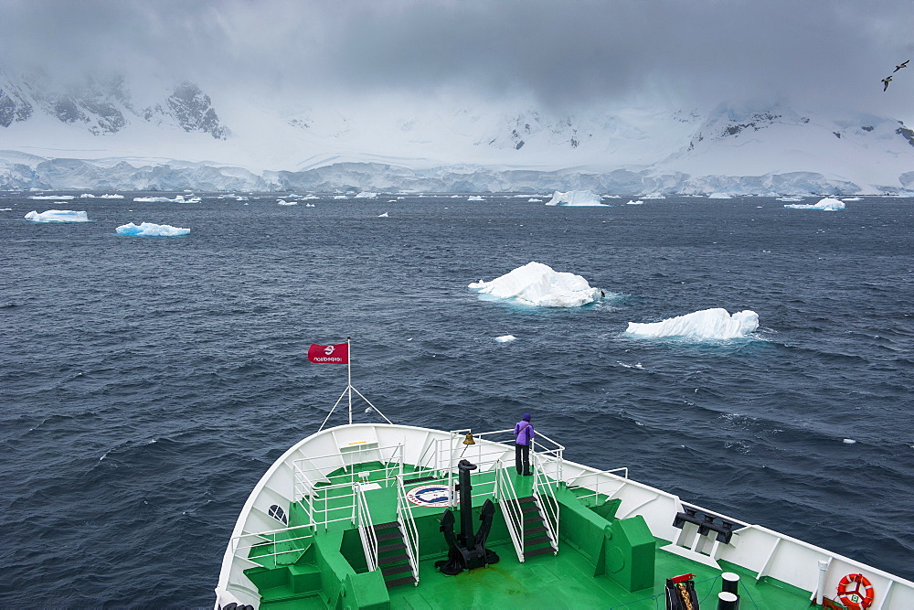 Dark clouds over the mountains and glaciers of Port Lockroy research station, Antarctica, Polar Regions