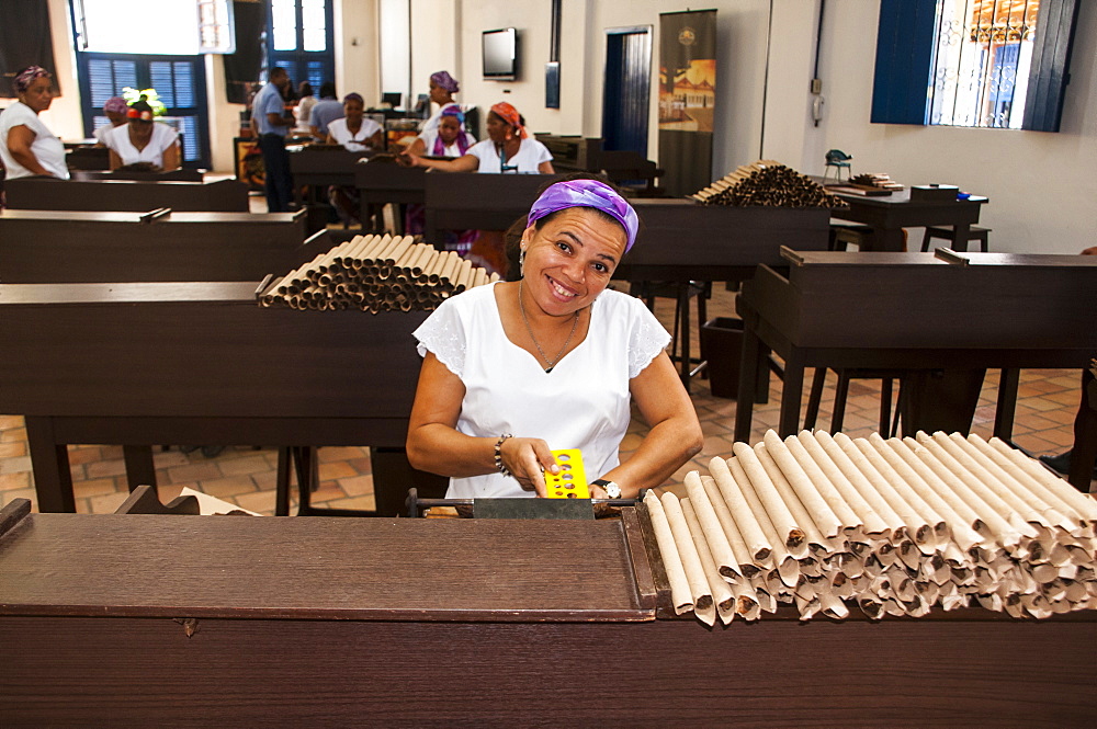 Woman rolling cigars in the Dannemann cigar company in Cachoeira, Bahia, Brazil, South America