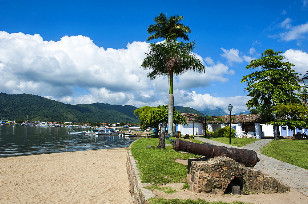 Old cannons on shore of the town of Paraty, Rio de Janeiro, Brazil, South America