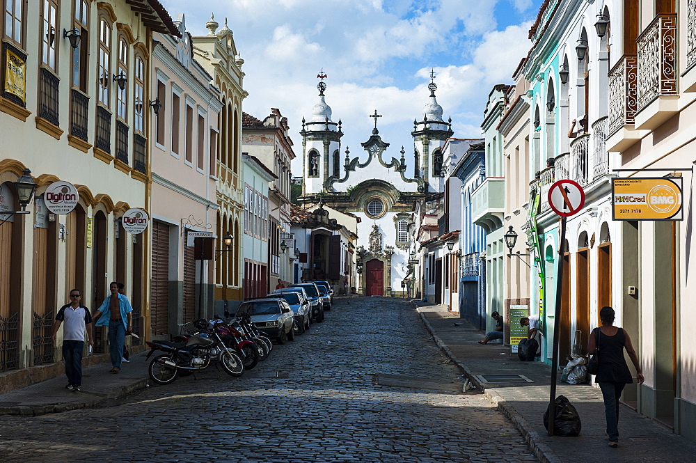 Road with colonial buildings leading to the Nossa Senhora do Carmo church in Sao Joao del Rei, Minas Gerais, Brazil, South America