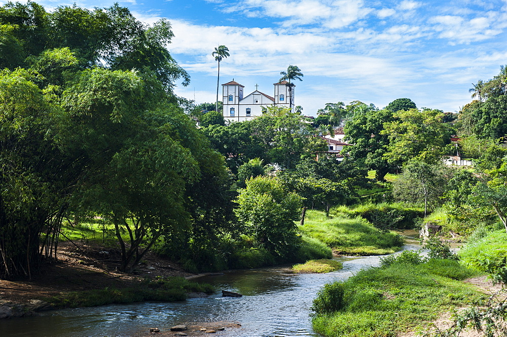 Matrix Church of Our Lady of the Rosary behind a pretty lush landscape in the historic village of Pirenopolis, Goais, Brazil, South America