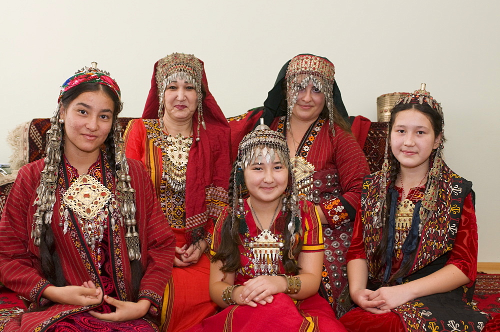 Group picture of Turkmen family in tradtional costume, Turkmenistan, Central Asia, Asia