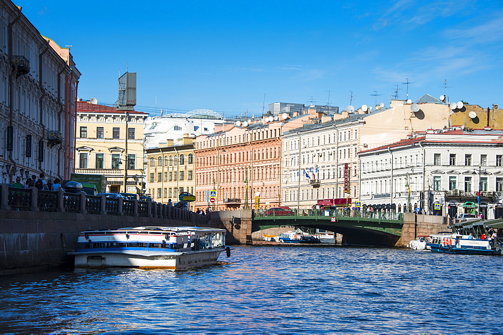 Tourist boat on a water channel in the center of St. Petersburg, Russia, Europe