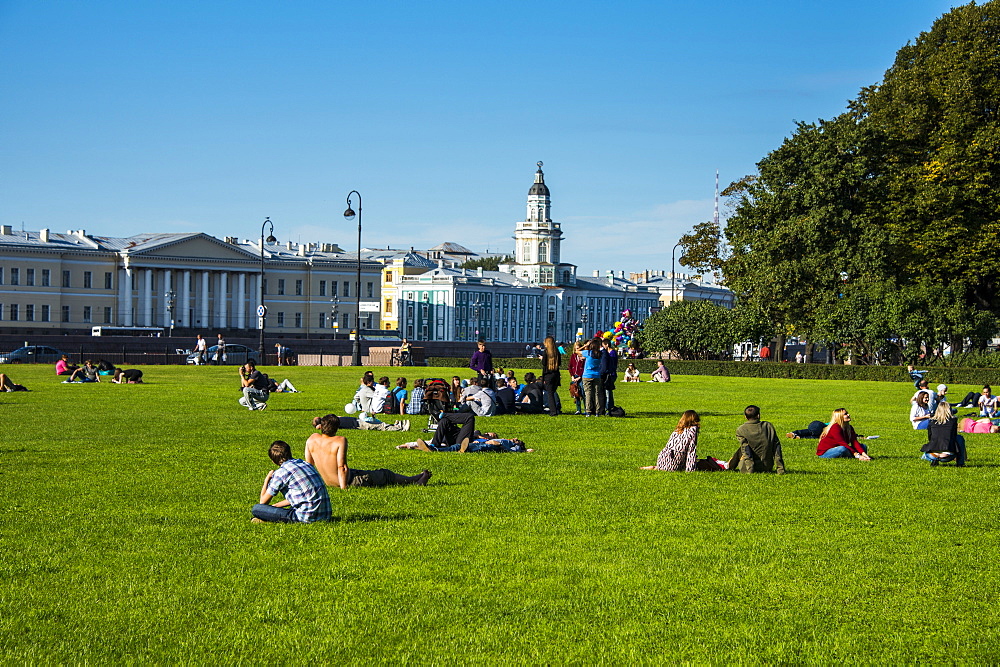 Green park in front of St. Isaac Cathedral on the River Neva, St. Petersburg, Russia, Europe