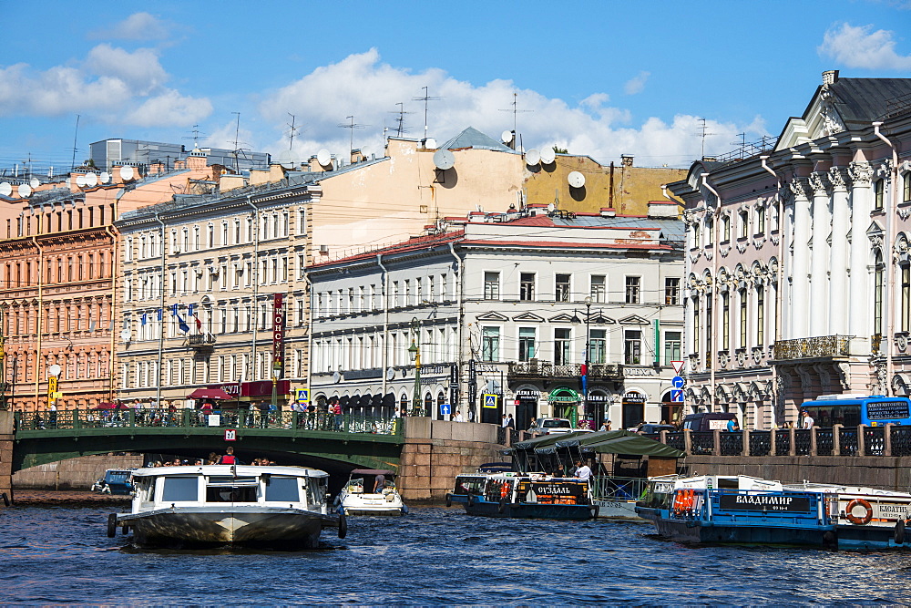 Tourist boat on a water channel in the center of St. Petersburg, Russia, Europe