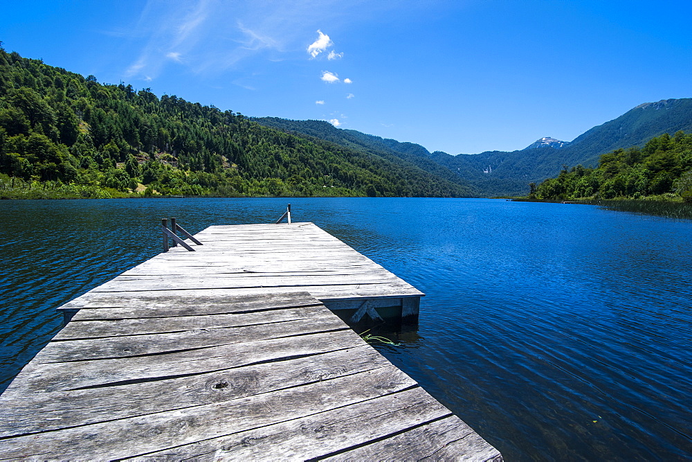 Wooden boat pier on Lago Tinquilco in the Huerquehue, southern Chile