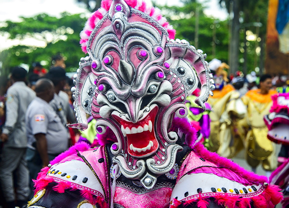 Colourful dressed masked man in the Carneval (Carnival) in Santo Domingo, Dominican Republic, West Indies, Caribbean, Central America