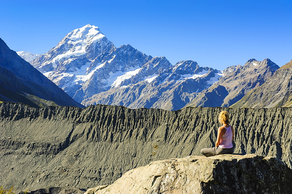 Woman enjoying the view of Mount Cook, UNESCO World Heritage Site, South Island, New Zealand, Pacific