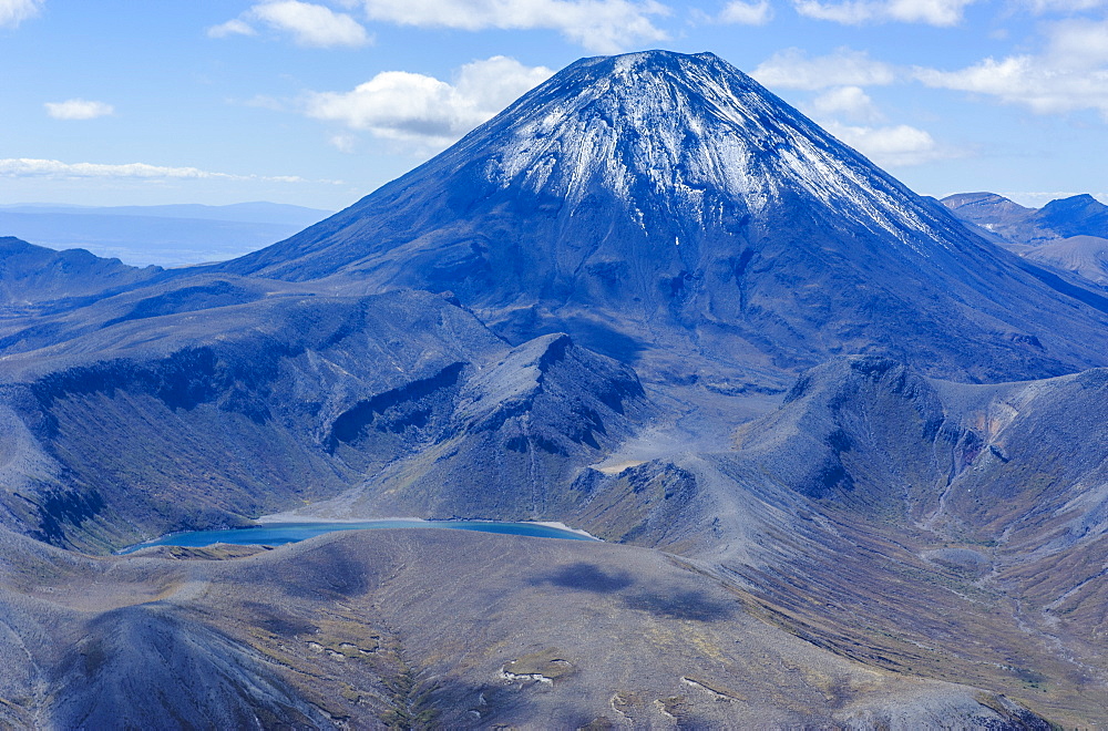 Aerial of the blue lake in front of Mount Ngauruhoe, Tongariro National Park, UNESCO World Heritage Site, North Island, New Zealand, Pacific