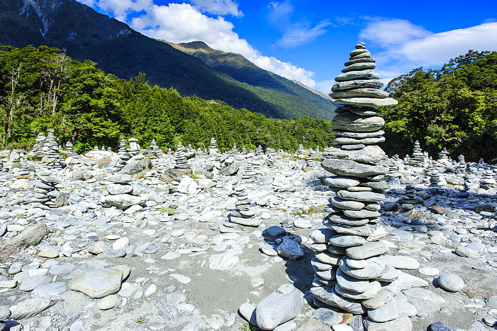 Man made stone pyramids at the Blue Pools, Haast Pass, South Island, New Zealand, Pacific