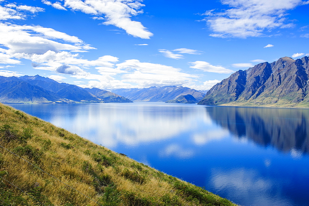 Cloud reflections in Lake Hawea, Haast Pass, South Island, New Zealand, Pacific