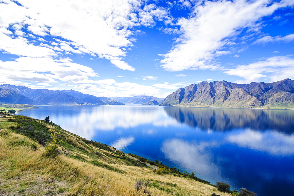 Cloud reflections in Lake Hawea, Haast Pass, South Island, New Zealand, Pacific