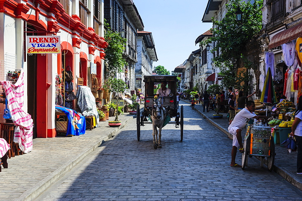 Horse cart riding through the Spanish colonial architecture in Vigan, UNESCO World Heritage Site, Northern Luzon, Philippines, Southeast Asia, Asia