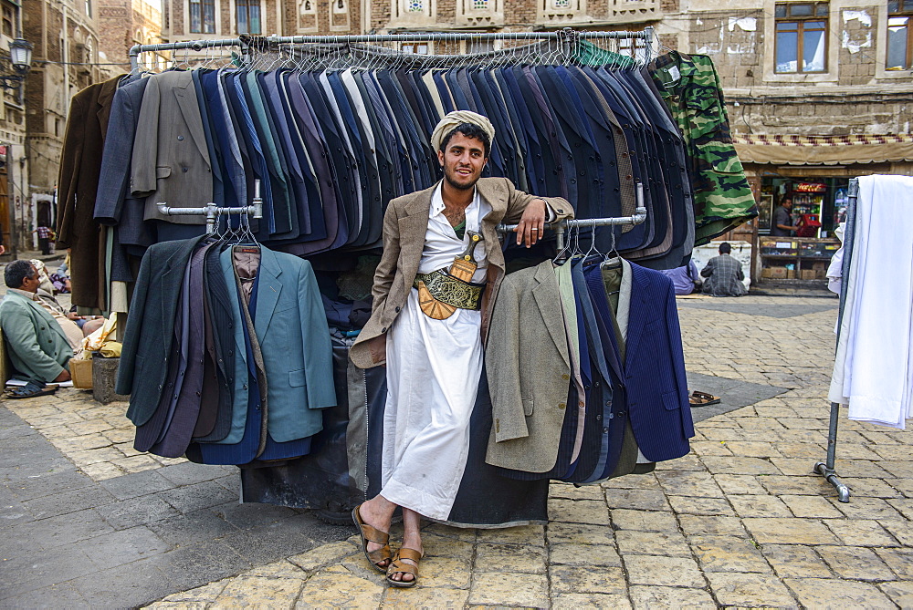 Man selling clothes in the Old Town, UNESCO World Heritage Site, Sanaa, Yemen, Middle East