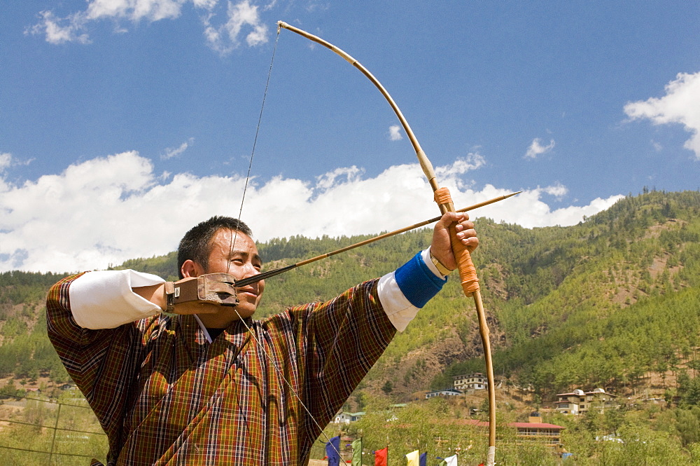 Man practising the national sport of archery, Thimpu, Bhutan, Asia