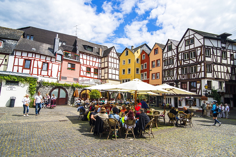 Restaurant in front of half timbered houses in Bernkastel-Kues, Moselle valley, Rhineland-Palatinate, Germany, Europe