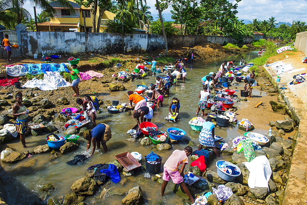 Women washing clothes in a river bed, City of Sao Tome, Sao Tome and Principe, Atlantic Ocean, Africa