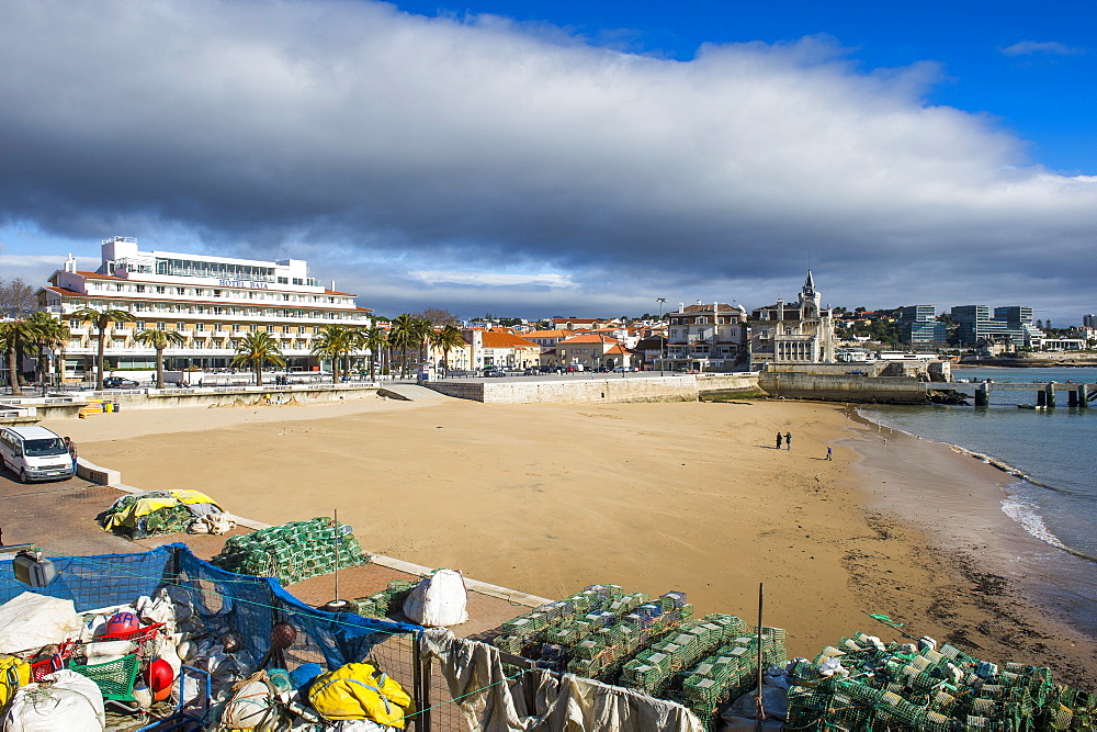 The beach of Praia do Peixe on the seafront of the seaside town of Cascais, Portugal, Europe