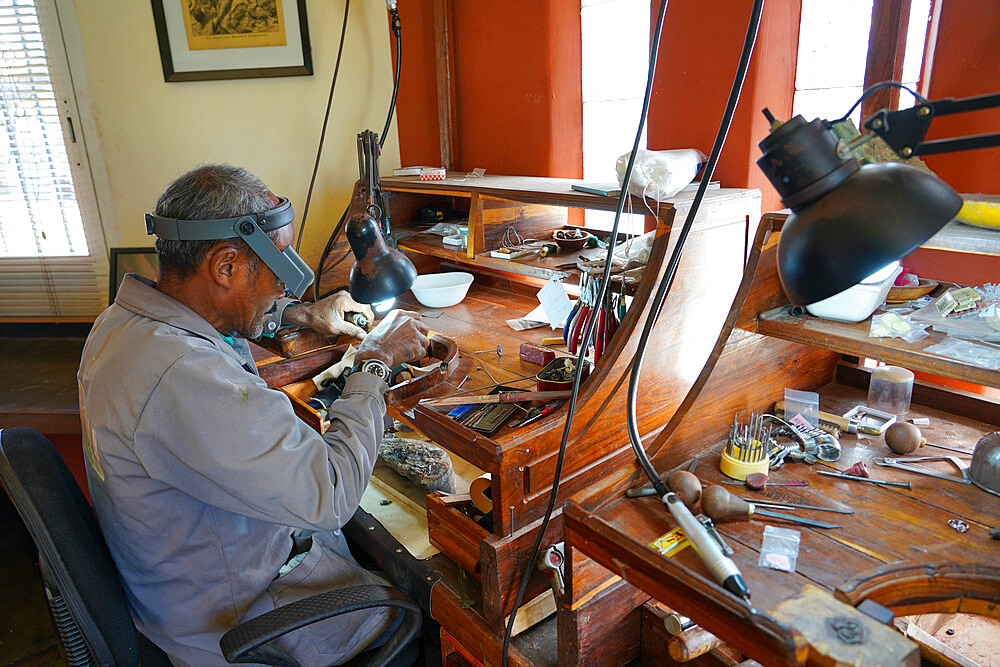 Gemologist working at a gem buyer shop, Ilakaka sapphire mines, Fianarantsoa province, Ihorombe Region, Southern Madagascar, Africa