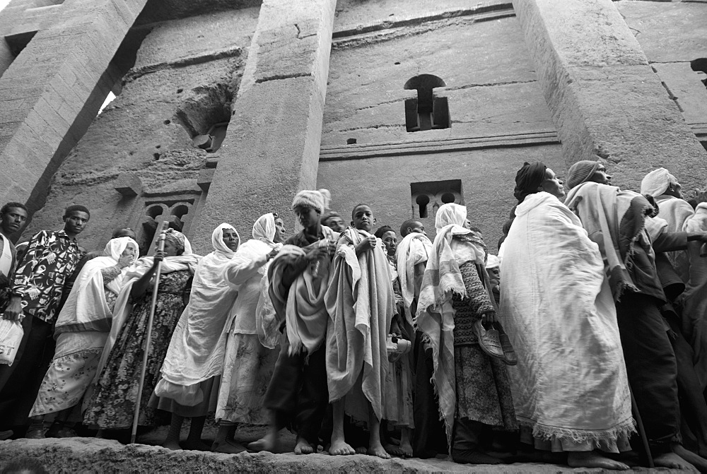 Pilgrims in front of Beth Medhane Alem monolithic church, Lalibela, Ethiopia, Africa