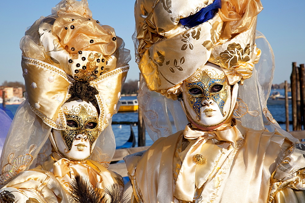 Masks at Venice Carnival in St. Mark's Square, Venice, Veneto, Italy, Europe