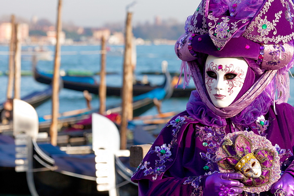 Masks at Venice Carnival in St. Mark's Square, Venice, Veneto, Italy, Europe