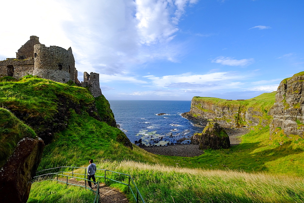 Dunluce Castle, located on the edge of a basalt outcrop in County Antrim, Ulster, Northern Ireland, United Kingdom, Europe