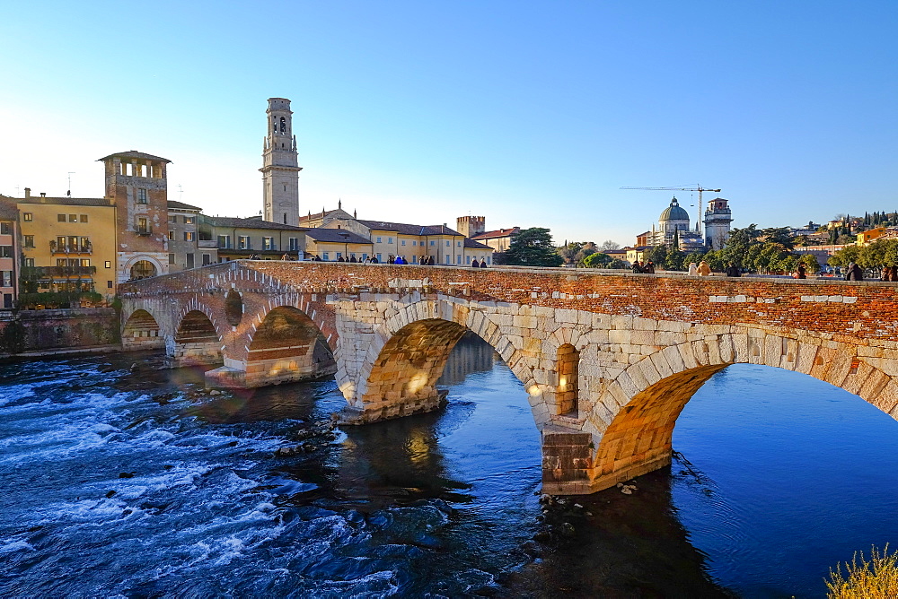 The Ponte Pietra, a Roman arch bridge crossing the Adige River in Verona, Veneto, Italy, Europe