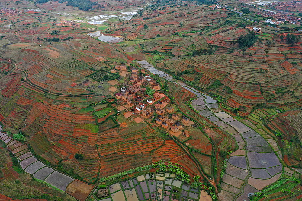 Rice fields and small villages near Ivato, Ambositra district, National Route RN7 between Ranomafana and Antsirabe, Madagascar, Africa