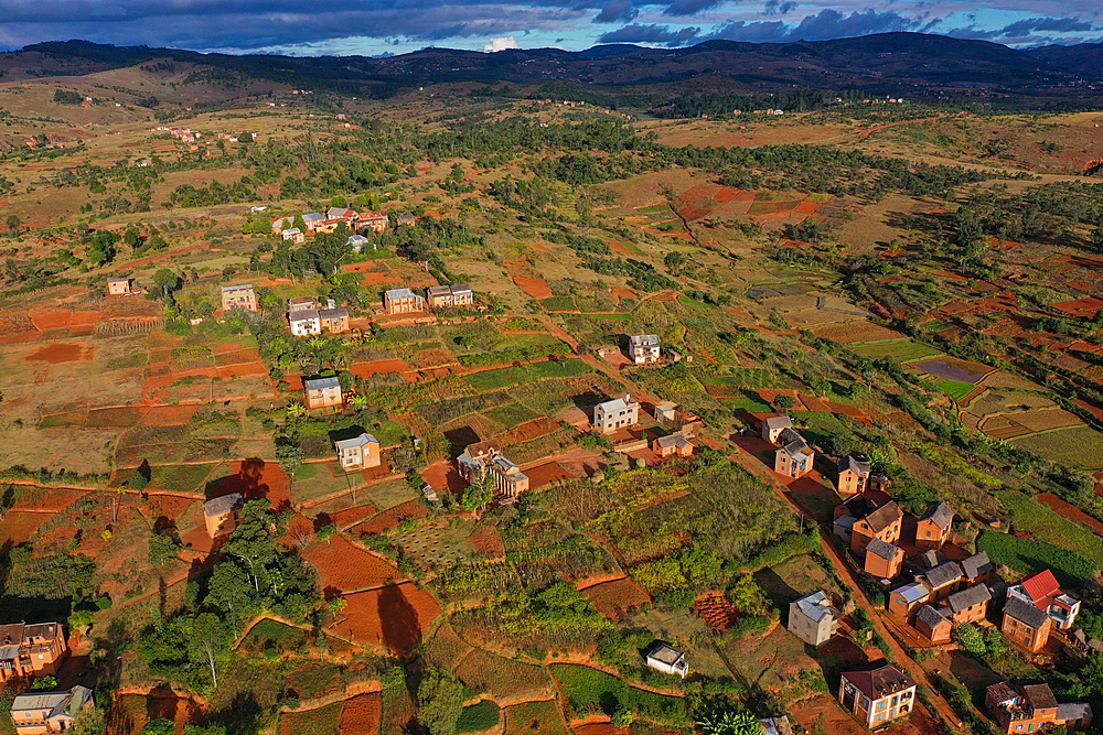 Rice fields and small mud villages near Sandrandahy, on the National Route RN7 between Ranomafana and Antsirabe, Madagascar, Africa