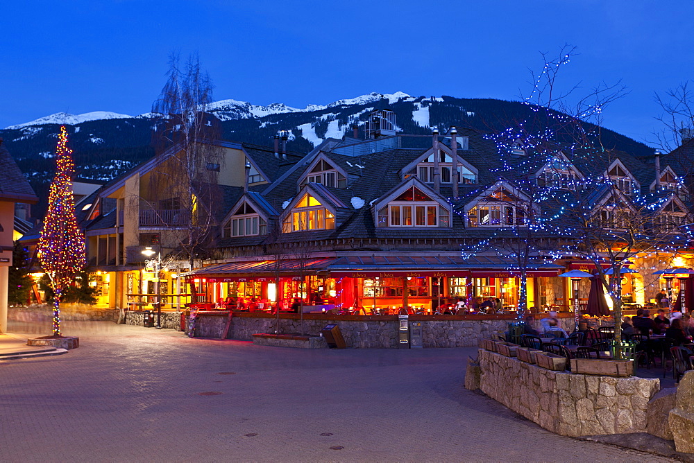 Village Square, Whistler VIllage at dusk, Whistler Blackcomb Ski Resort, Whistler, British Columbia, Canada, North America