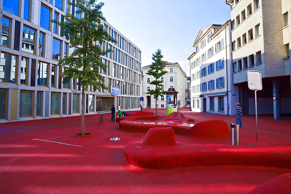 Stadtlounge (City Lounge) by artist Pipilotti Rist and the Carlos Martinez architectural firm, featuring a red polymer surface resembling a carpet that covers everything in its path, with blimp shaped lights, St. Gallen, Switzerland, Europe