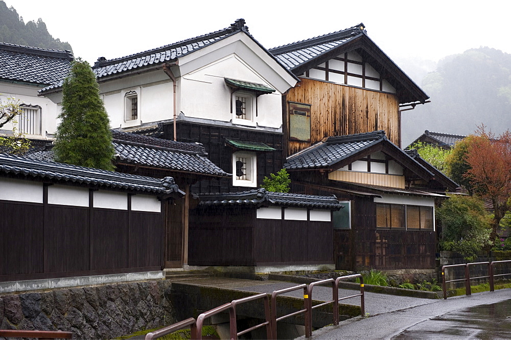 Traditional treasure warehouse (kura), beside single-family residence in Fukui, Japan, Asia