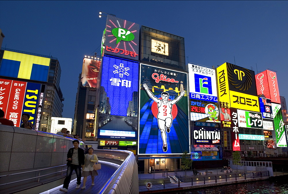 Famous neon wall with Glico runner advert in Dotonbori district of Namba, Osaka, Japan, Asia