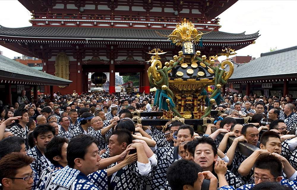 A mikoshi (portable shrine) being carried to Sensoji Temple during the Sanja Festival in Asakusa, Tokyo, Japan, Asia