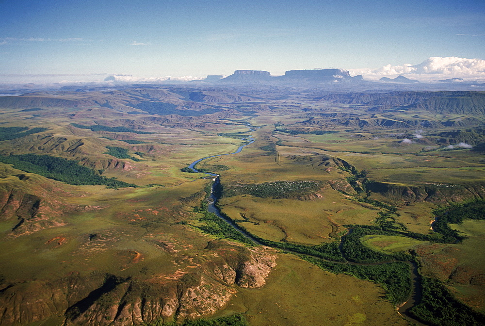 Aerial image of River Kukenan looking north to tepuis of Mount Kukenaam (Kukenan) (Cuguenan) and Mount Roraima, Gran Sababa, Venezuela, South America