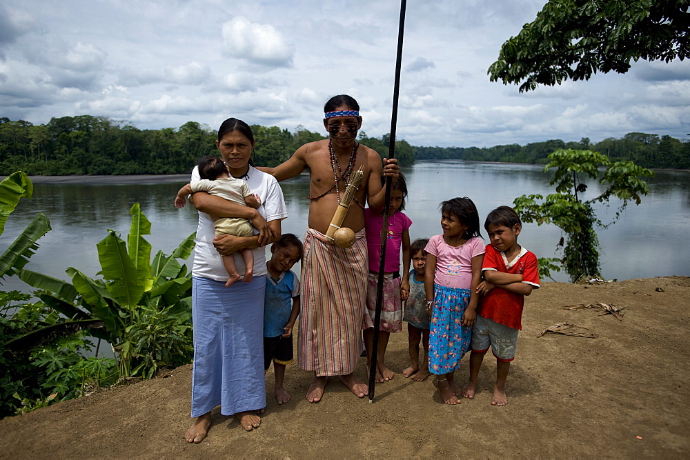 The village Syndico of Suwa community with his family, Amazon, Ecuador, South America