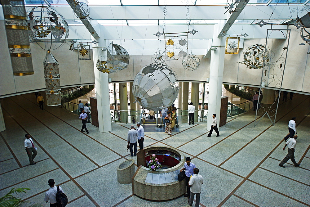 Traders cross the floor in the lobby of the World Trade Center, Colombo, Sri Lanka, Asia