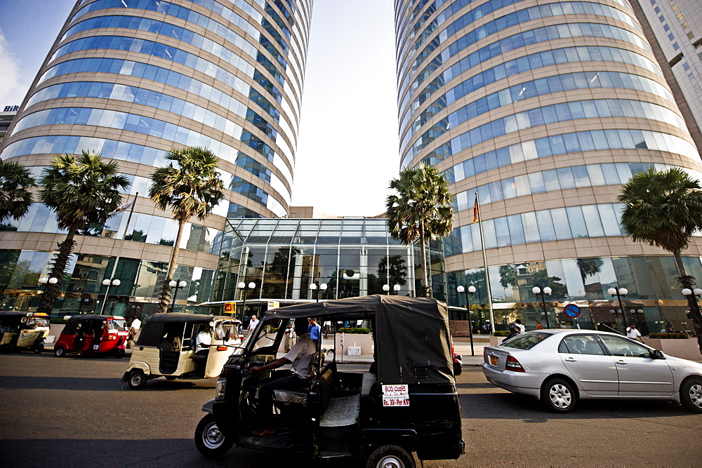 A tuk tuk in front of the World Trade Centre, Colombo, Sri Lanka, Asia 