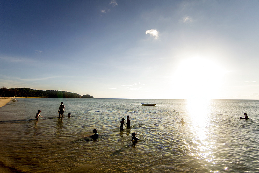 Children play on Simpang Mengayau beach, an emerging eco tourism destination in the Tun Mustapha Park, Malaysian Borneo, Malaysia, Southeast Asia, Asia 