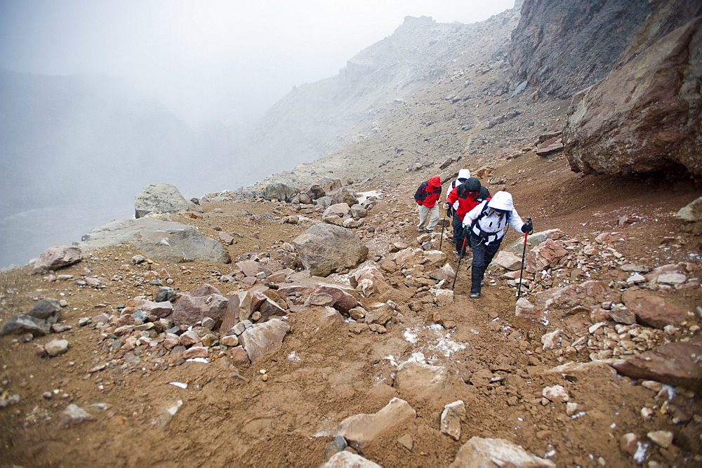 Mountain climbers ascend Cayambe volcano, Ecuador, South America